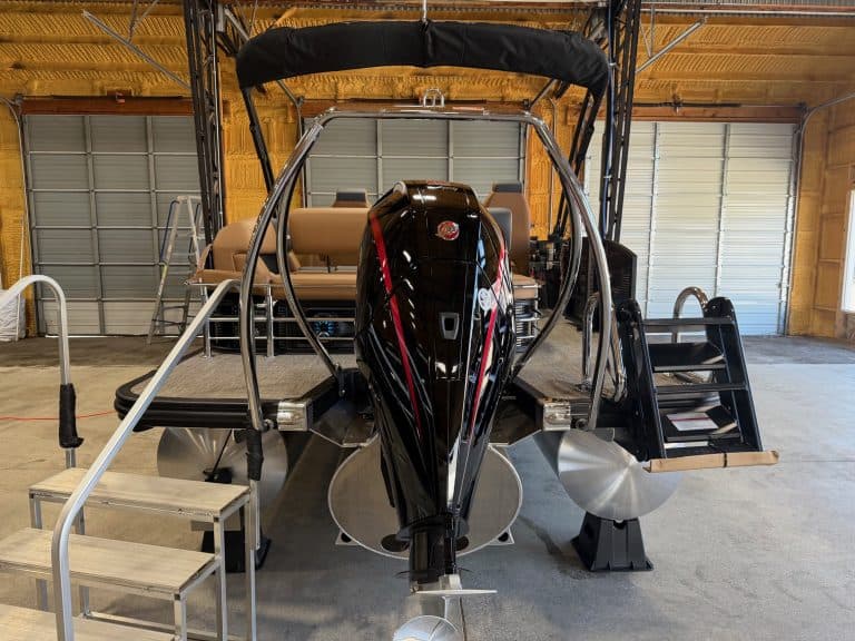 Premium Bennington 23 SSB pontoon boat for sale at Hall's Sport Center. Perfect for family outings a.