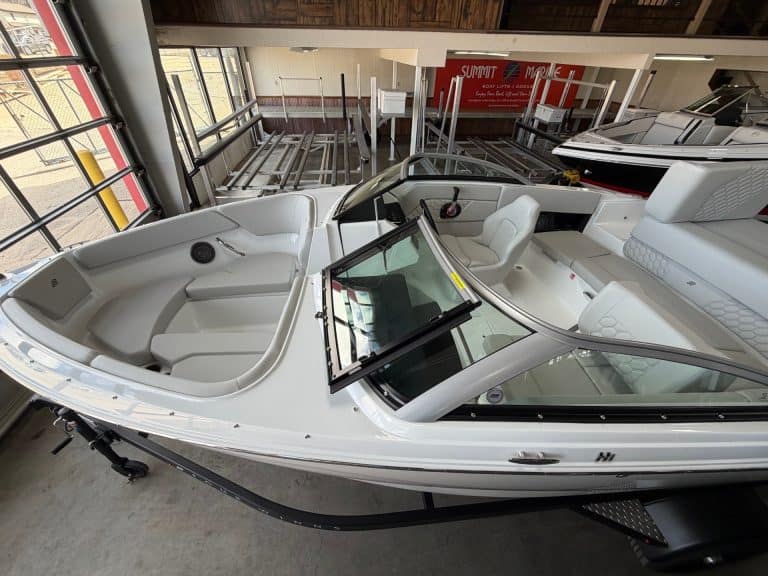 Luxury boat with sleek design and spacious seating.