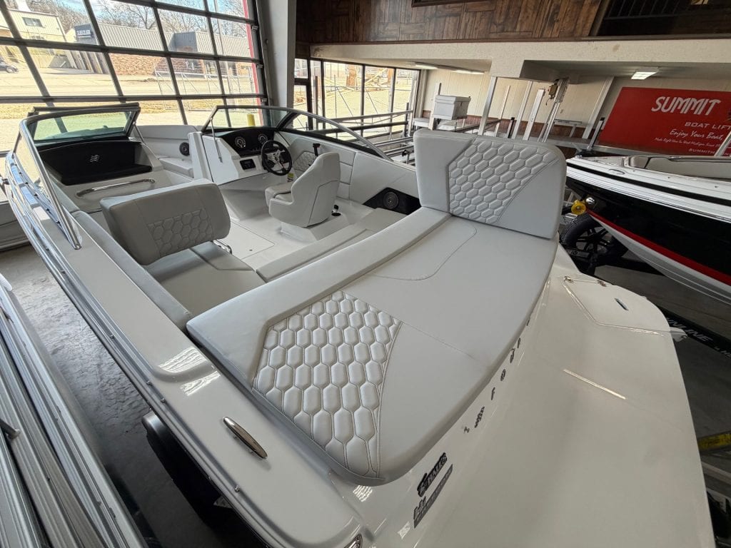 Modern Four Winns H1 Freedom boat with spacious seating and sleek design.