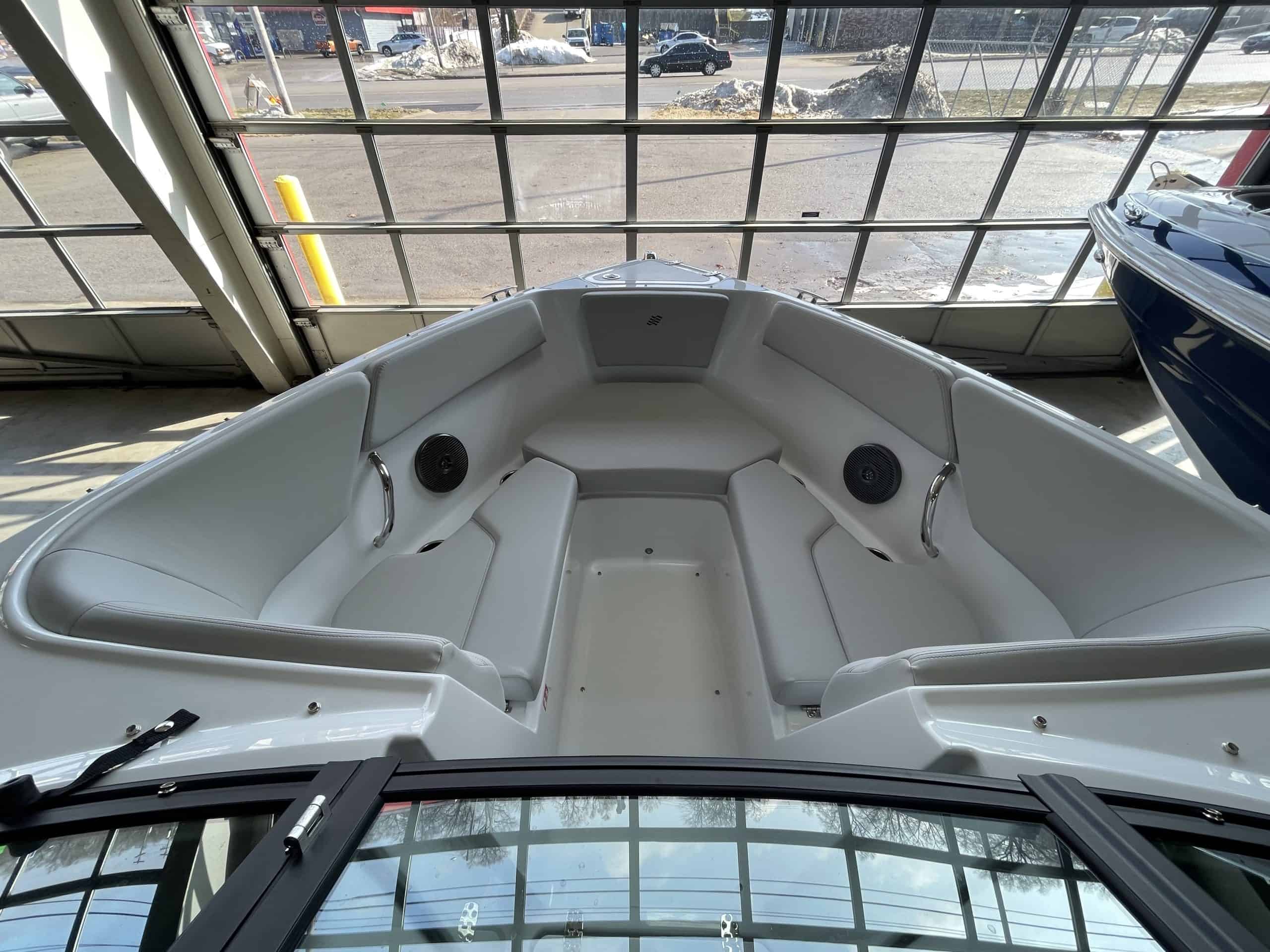Four Winns H2 FREEDOM boat at Hall's Sport Center showroom.