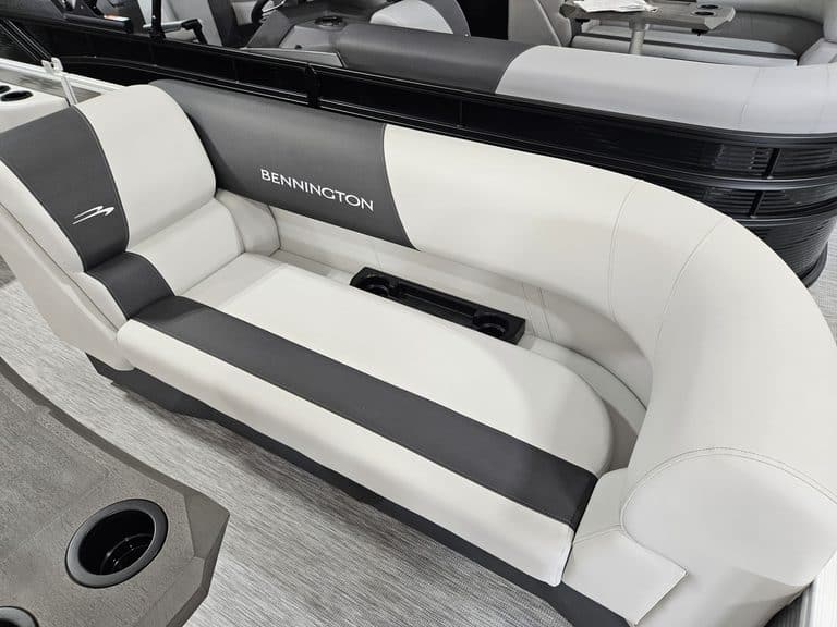 Bennington boat with white and black seating at Hall's Sport Center.