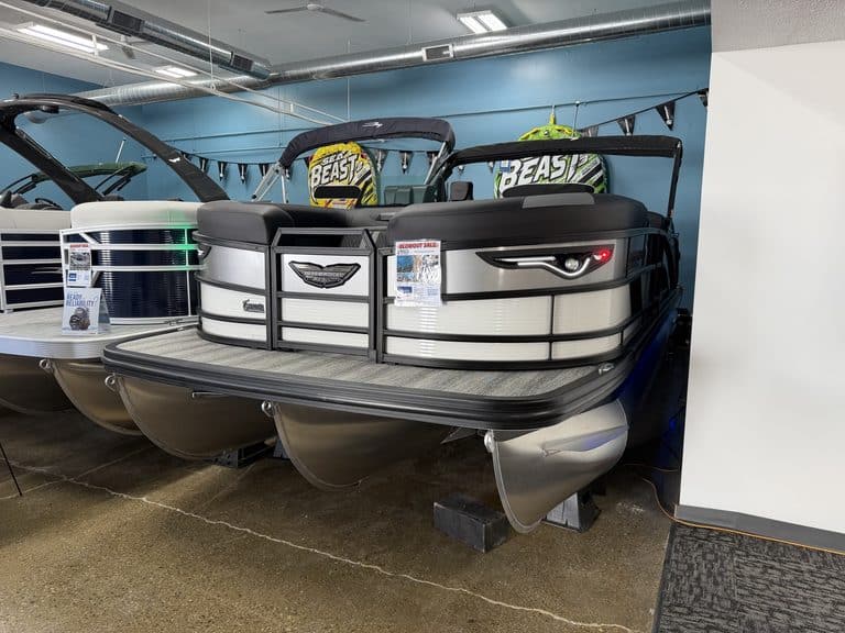 Bennington 22 MSB pontoon boat with dual engines and seating.