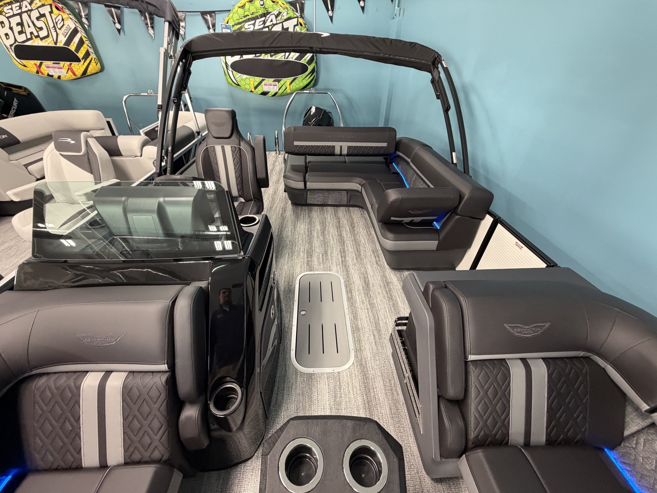 Interior view of a Bennington 22 MSB pontoon boat at Hall's Sport Center.
