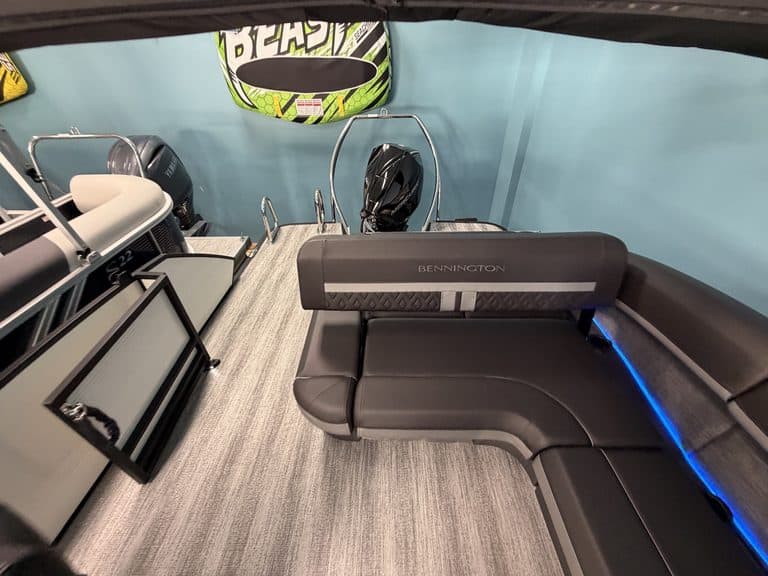 Interior view of a Bennington 22 MSB pontoon boat with seating and equipment.