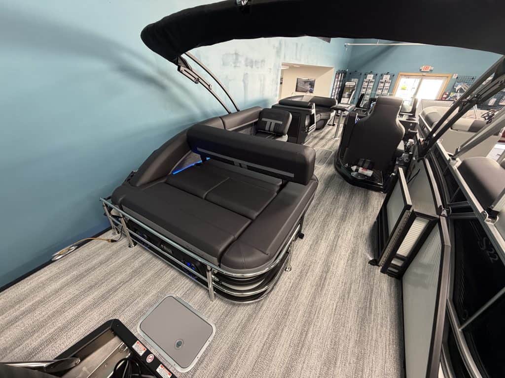 Indoor gym with massage tables and exercise machines at Hall's Sport Center.