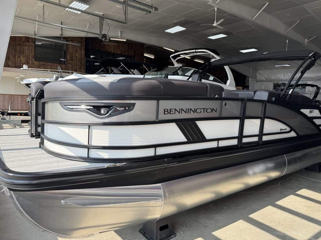 Bennington 22 MSB pontoon boat displayed indoors at Hall's Sport Center.