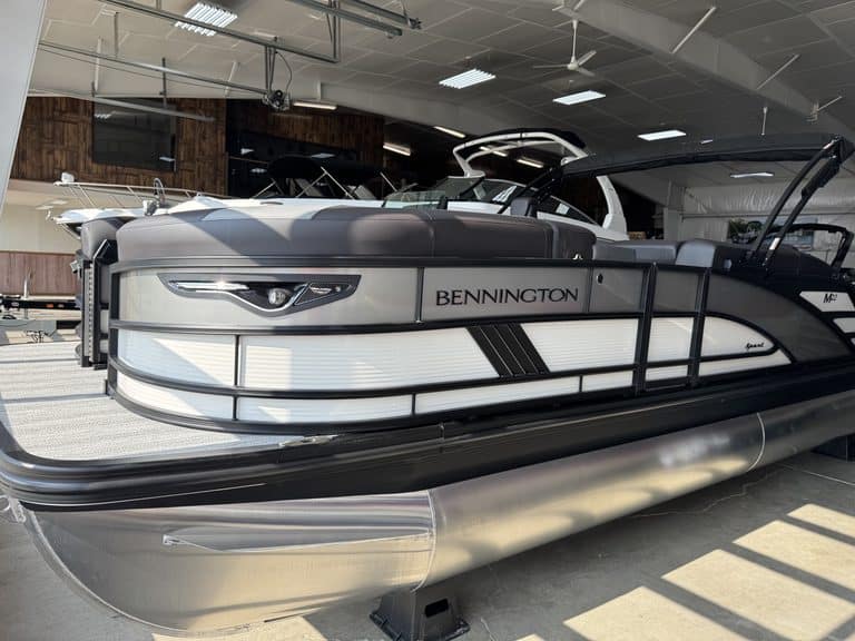 Bennington 22 MSB pontoon boat displayed indoors at Hall's Sport Center.