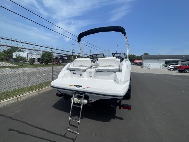 White 2018 Scarab 195 G boat on trailer at Hall's Sport Center.