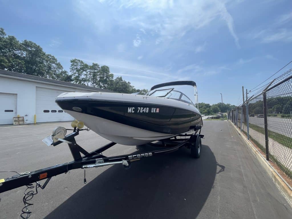 2018 Scarab 195 G speedboat on trailer at Hall's Sport Center.