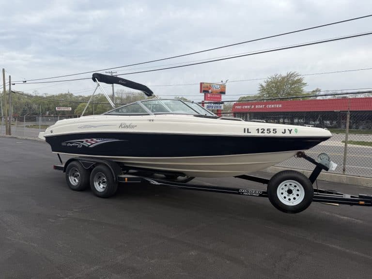 Speedboat on trailer parked outside Hall's Sport Center in Illinois.