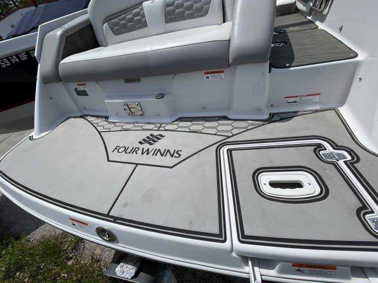 Aluminum boat deck with seating and non-slip surface at Hall's Sport Center.