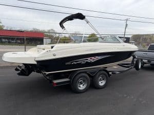 Speedboat on trailer for water sports and boat rentals at Hall's Sport Center.