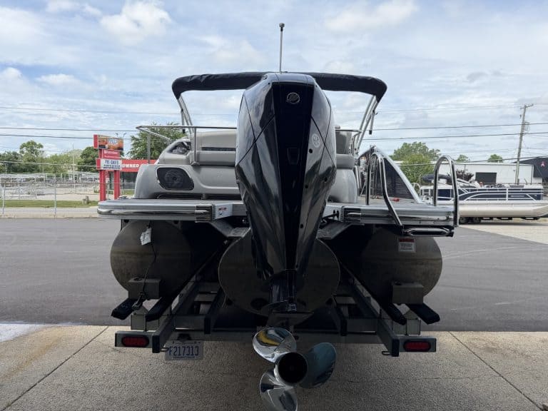Bennington 25QSB pontoon boat on trailer at Hall's Sport Center.