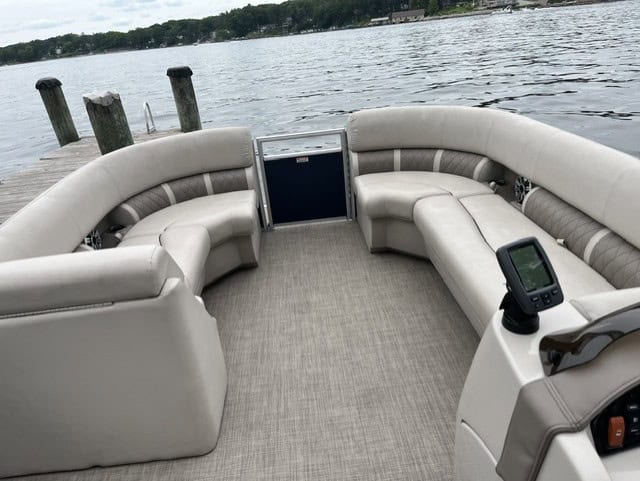 Interior view of a Bennington 21 SLX pontoon boat on the water.