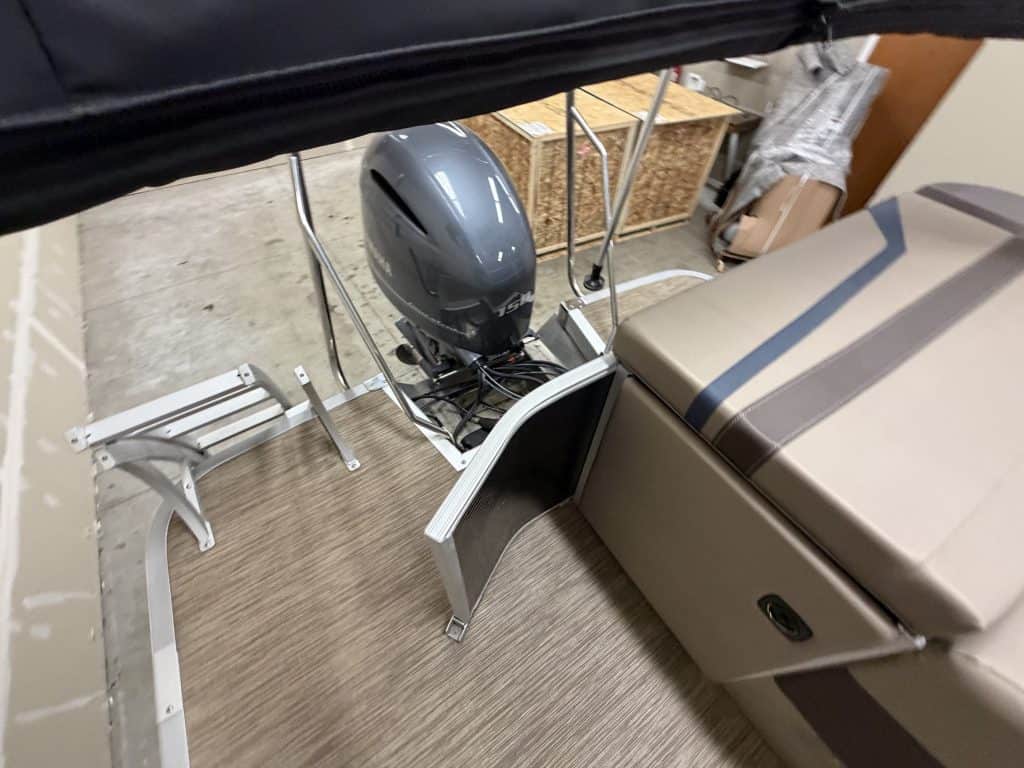 Bennington 21SXL boat with motor and accessories at Hall's Sport Center.