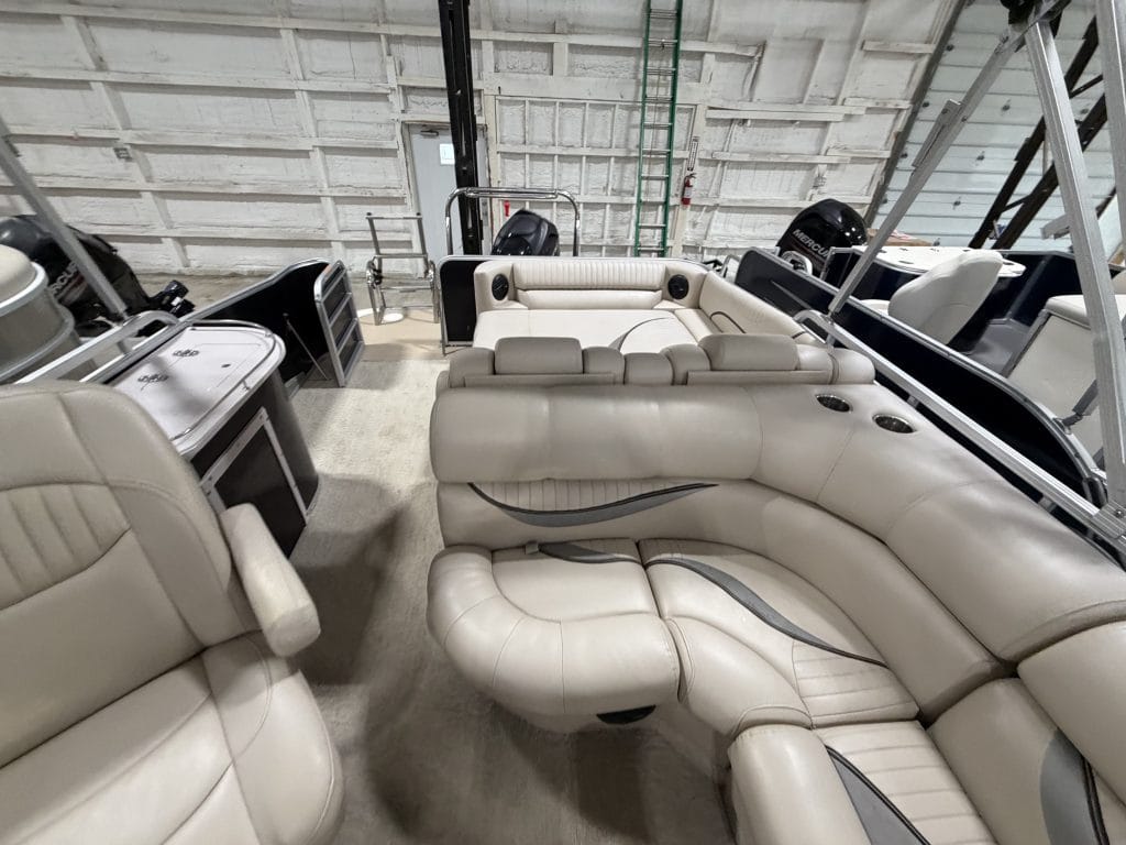 Luxury Berkshire 223 SLX boat with beige seating and modern design.