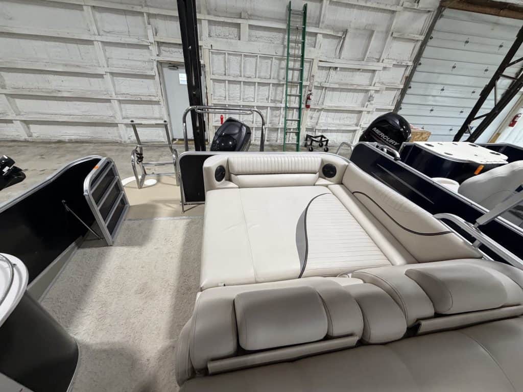 Luxury Berkshire 223 SLX boat with seating and outboard motors at Hall's Sport Center.