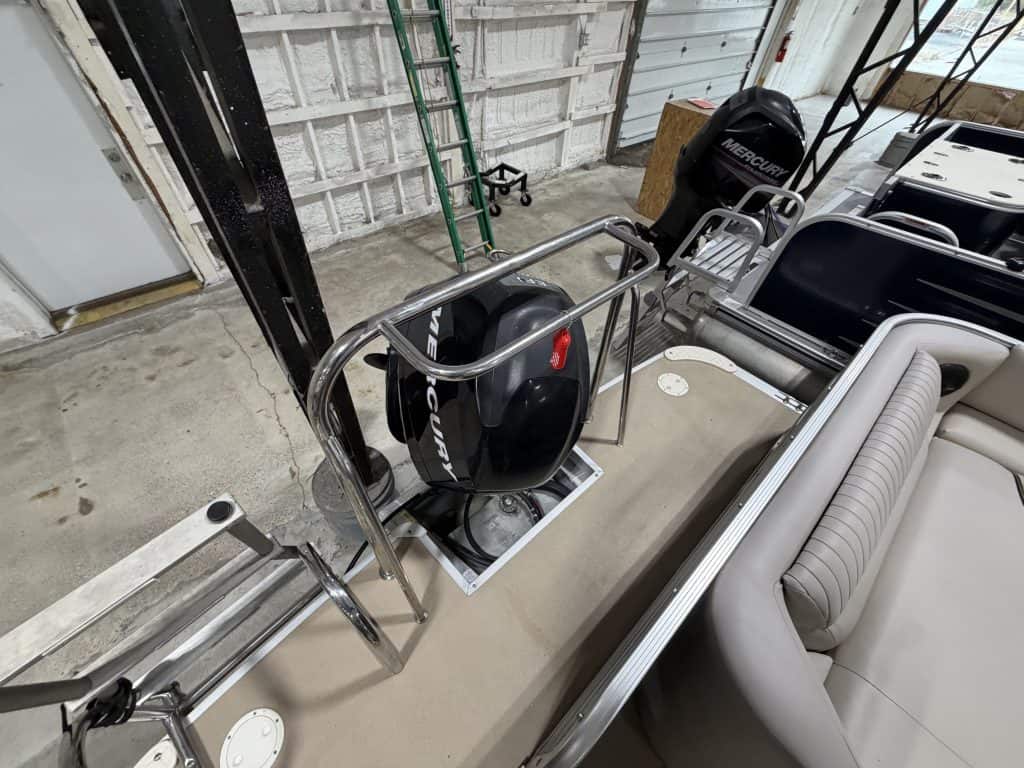 Luxury Berkshire 223 SLX boat with seating and engine at Hall's Sport Center.