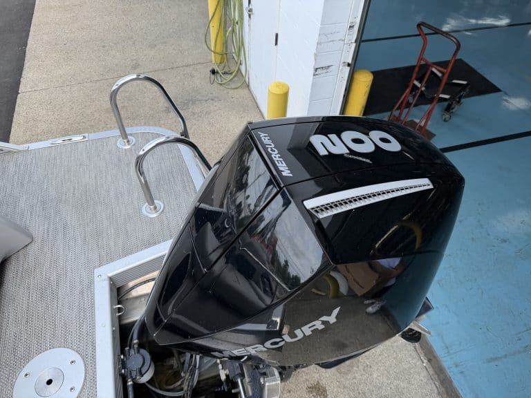 Mercury 200 outboard motor on boat at Hall's Sport Center.