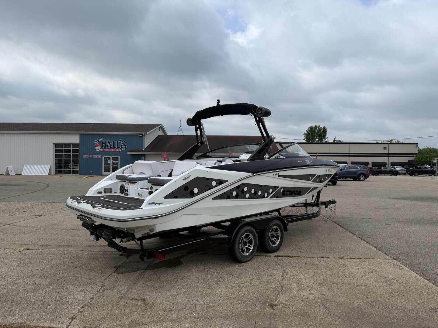 2021 Scarab 255ID luxury boat on trailer at Hall's Sport Center.