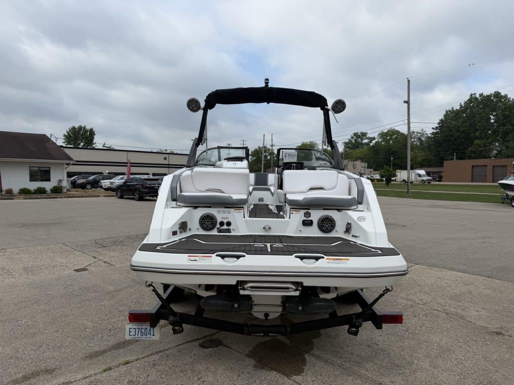 2021 Scarab 255ID luxury boat on trailer at marina.