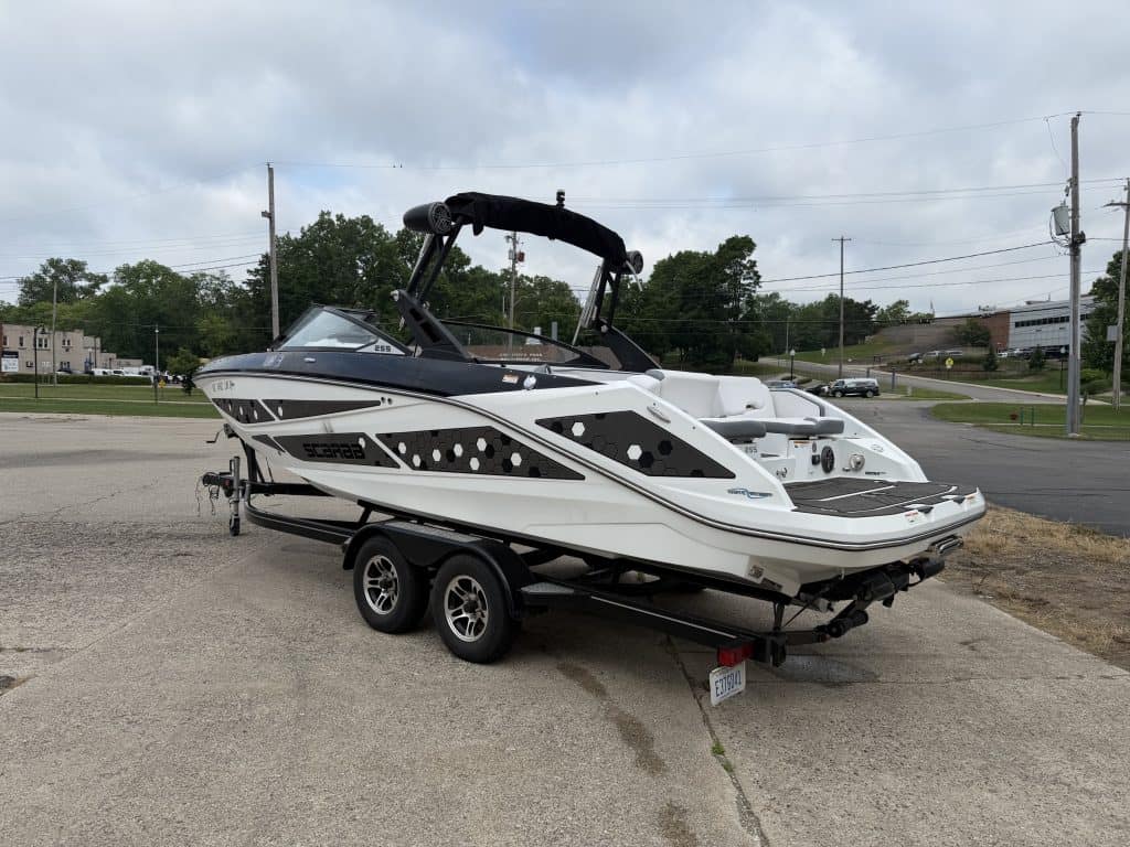 2021 Scarab 255ID luxury powerboat on trailer at Hall's Sport Center.