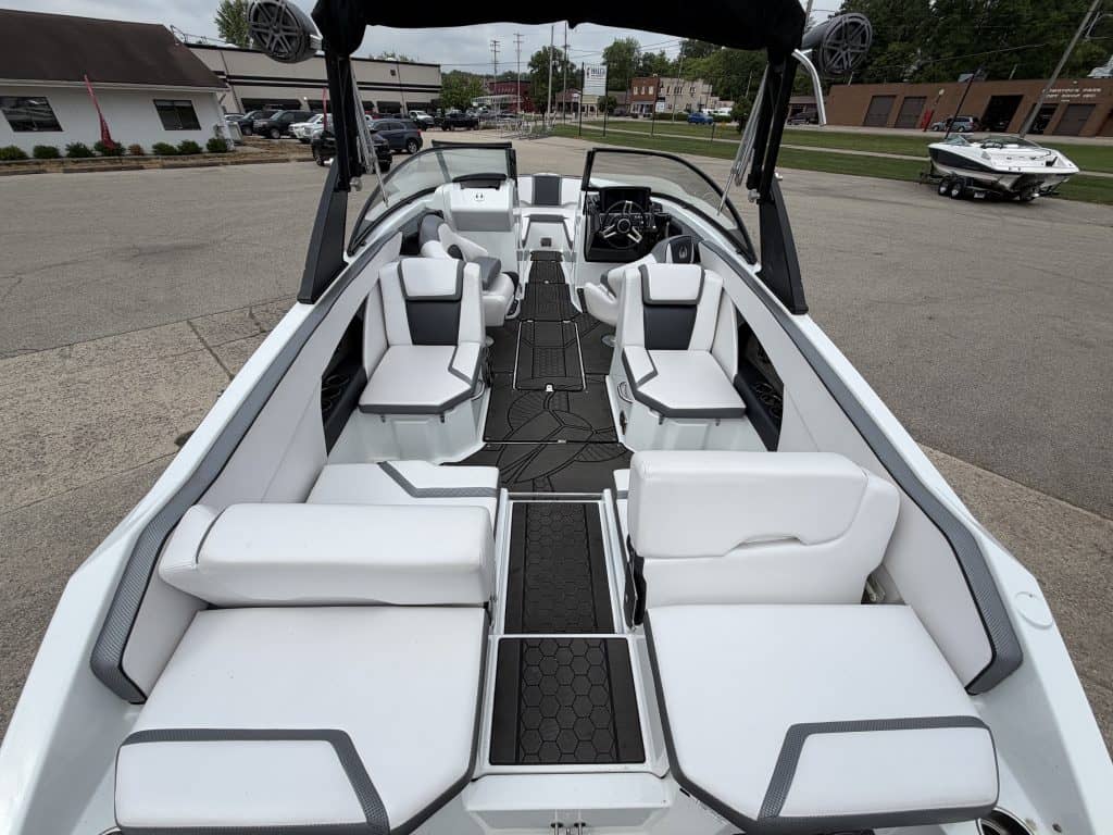 Luxury Scarab 255ID boat with white seating at Hall's Sport Center.
