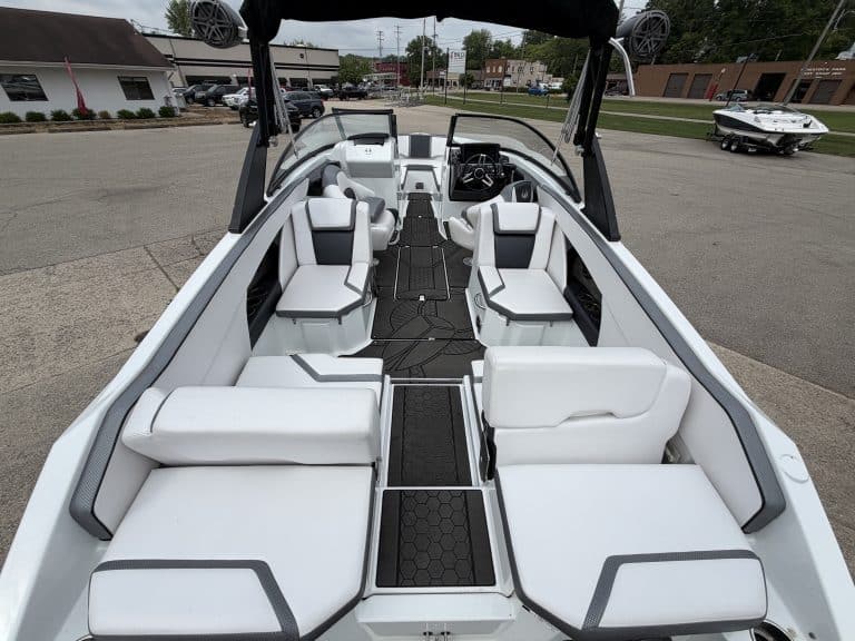 Luxury Scarab 255ID boat with white seating at Hall's Sport Center.