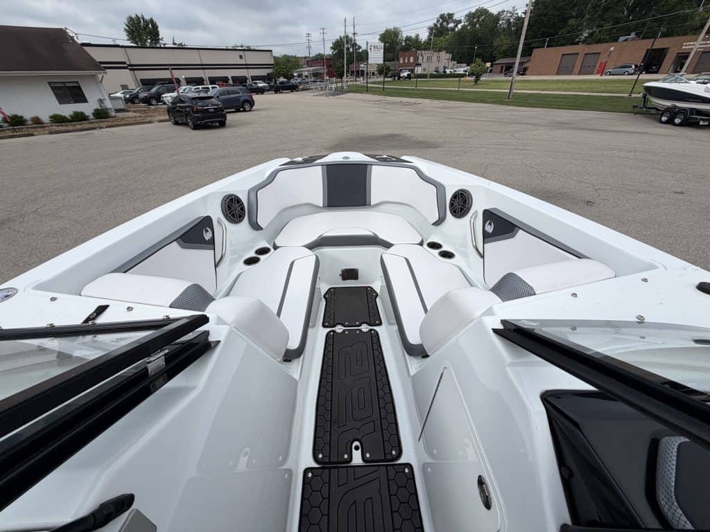 White Scarab 255ID boat displayed at Hall's Sport Center for sale or rental.