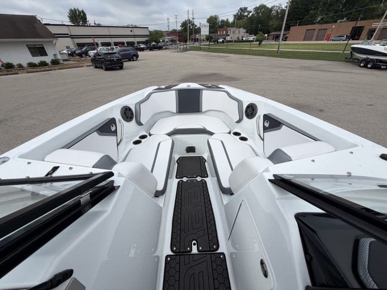 White Scarab 255ID boat displayed at Hall's Sport Center for sale or rental.