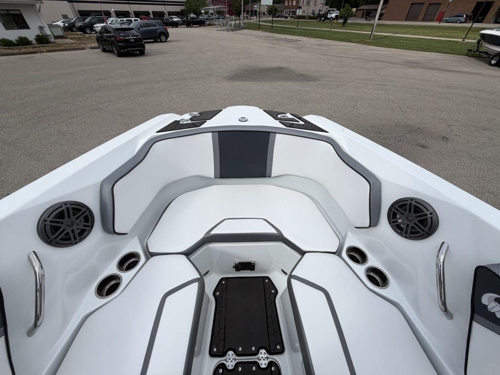 View of a white watercraft at Hall's Sport Center for boating and water sports.