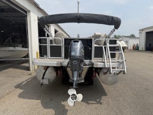Bennington 21 SS pontoon boat with outboard motor at Hall's Sport Center.