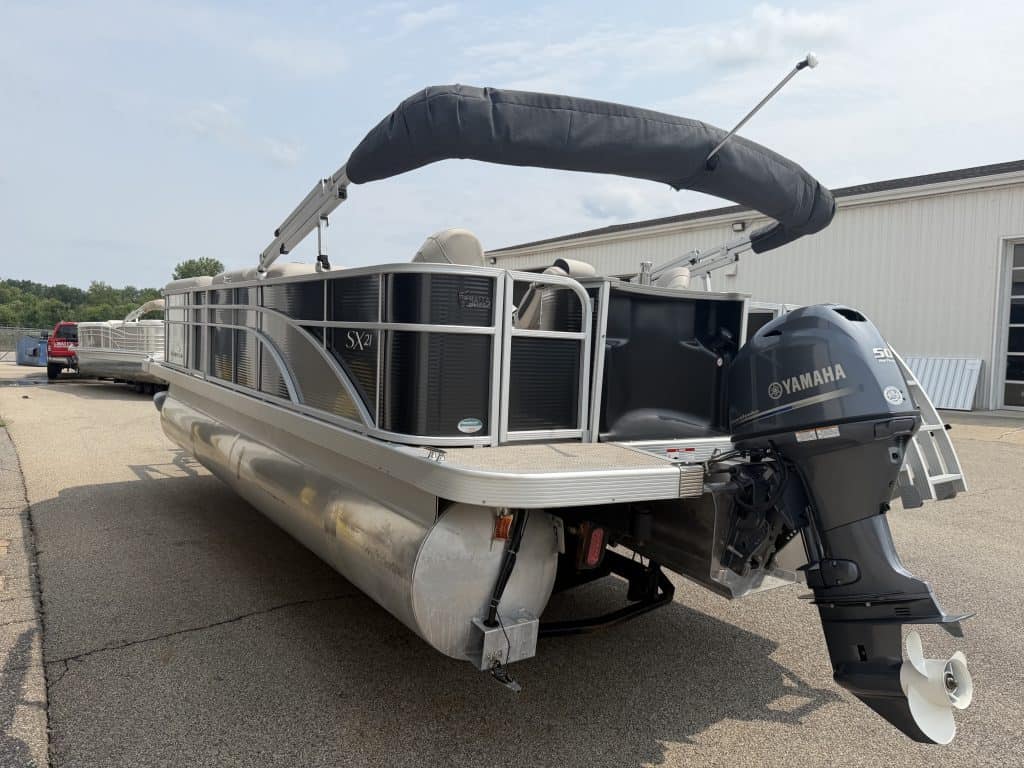 Bennington 21 SS pontoon boat with Yamaha engine and canopy.