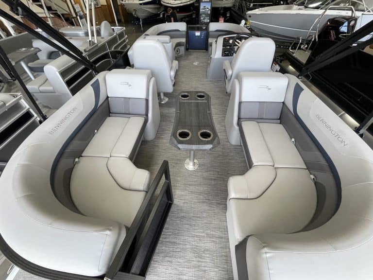 Luxury pontoon boat seating with comfortable, stylish cushions at Hall's Sport Center.