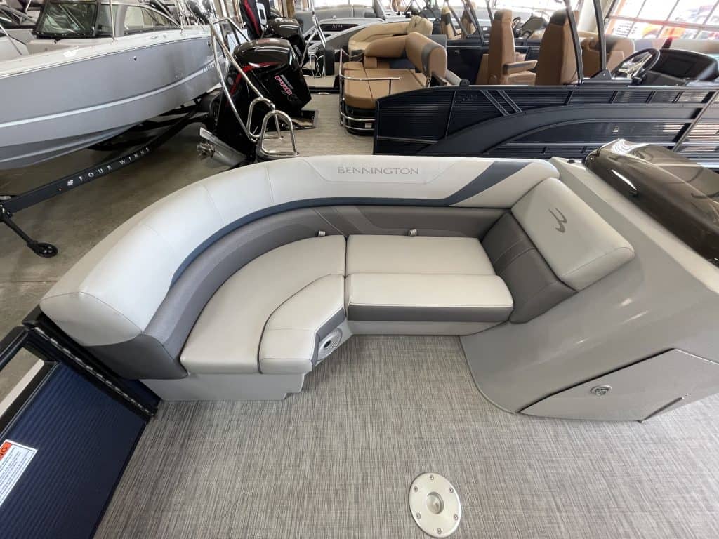 Modern boat lounge seating with comfortable cushions at Hall's Sport Center.
