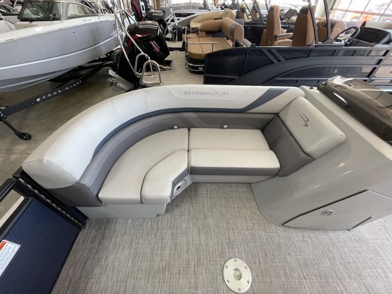 Modern boat lounge seating with comfortable cushions at Hall's Sport Center.