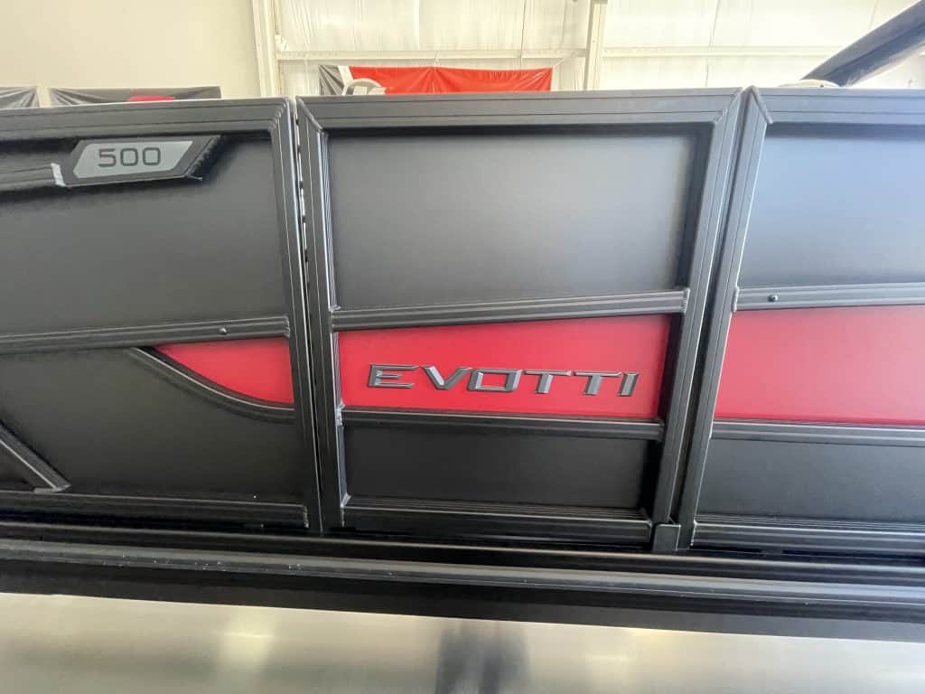 Close-up of EVOTTI 521 QL electric vehicle at Hall's Sport Center.