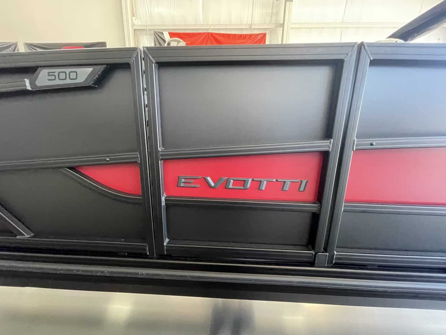 Close-up of EVOTTI 521 QL electric vehicle at Hall's Sport Center.