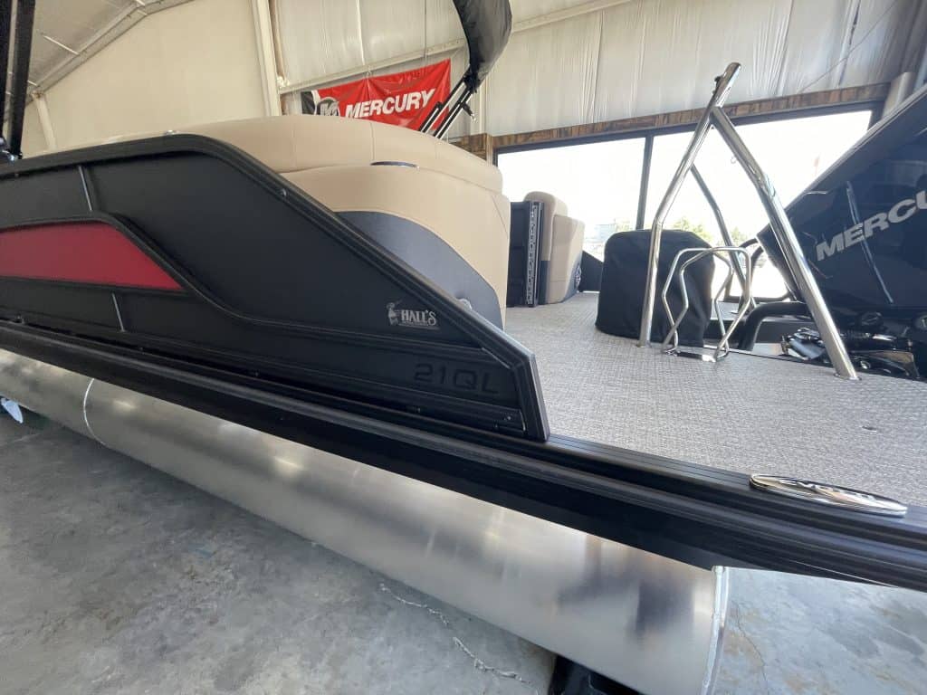 Luxury boat on display at Hall's Sport Center with Mercury engine.