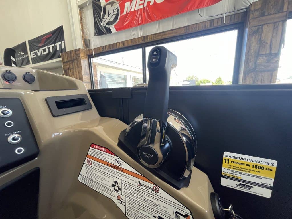 Golf cart control panel with steering wheel and dashboard features.