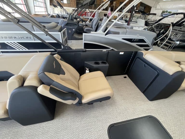 Luxury boat interior with captain's seat and spacious seating area.