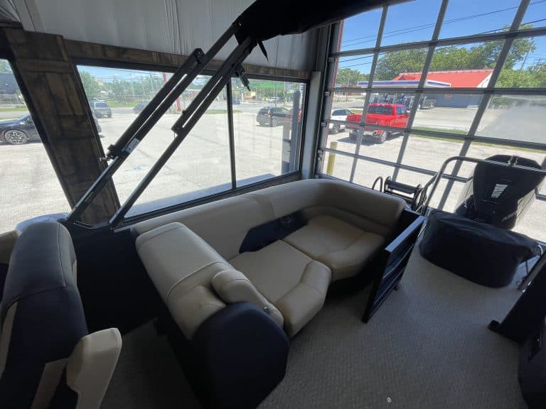 Comfortable indoor seating area at Hall's Sport Center with large windows.