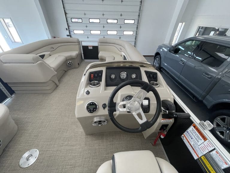 Bennington 21 SS pontoon boat dashboard and seating area.
