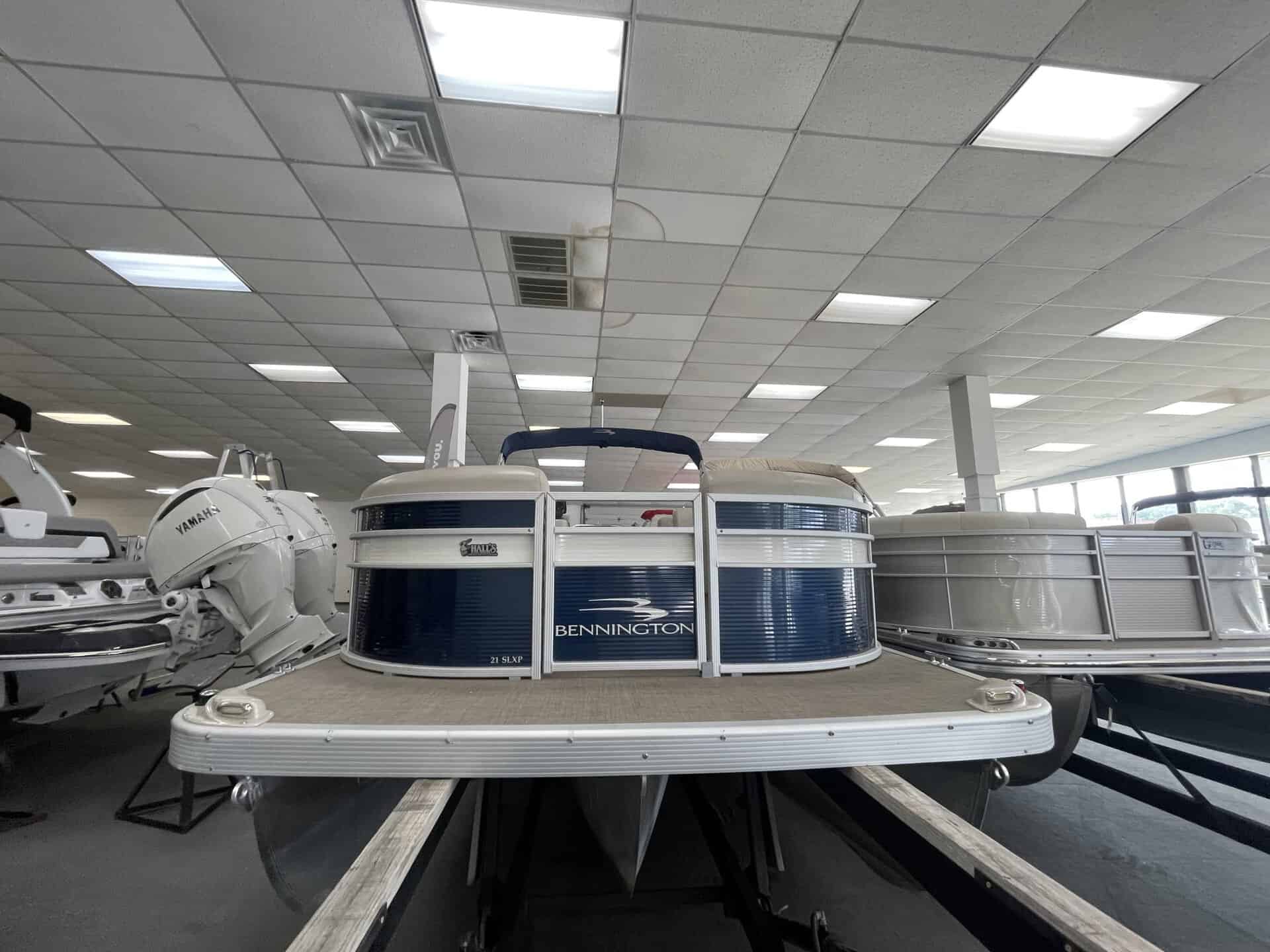 Bennington 21 SLX pontoon boat displayed at Hall's Sport Center.