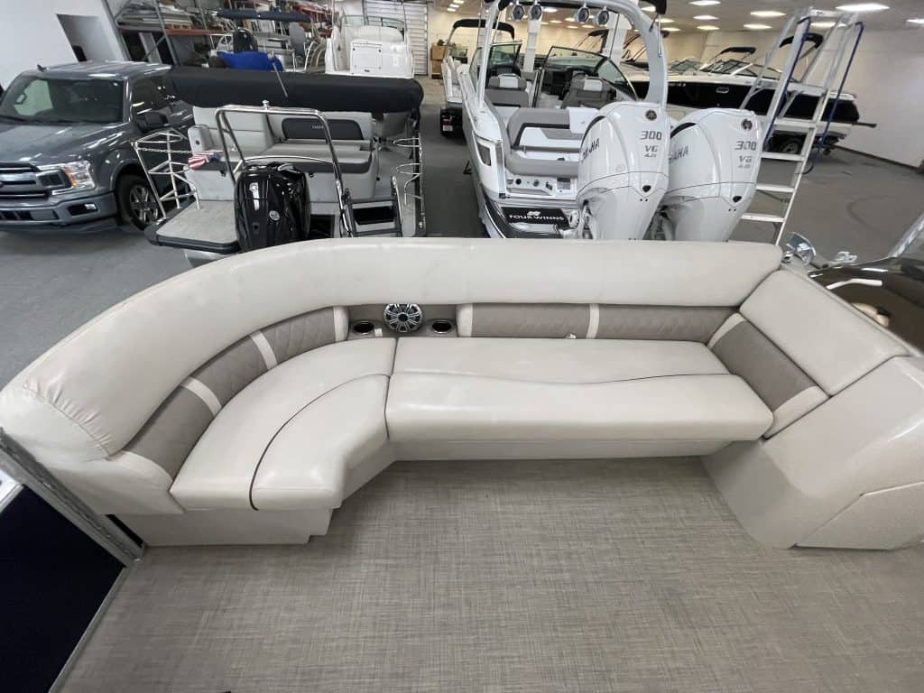 Luxury Bennington 21 SLX pontoon boat with spacious seating.