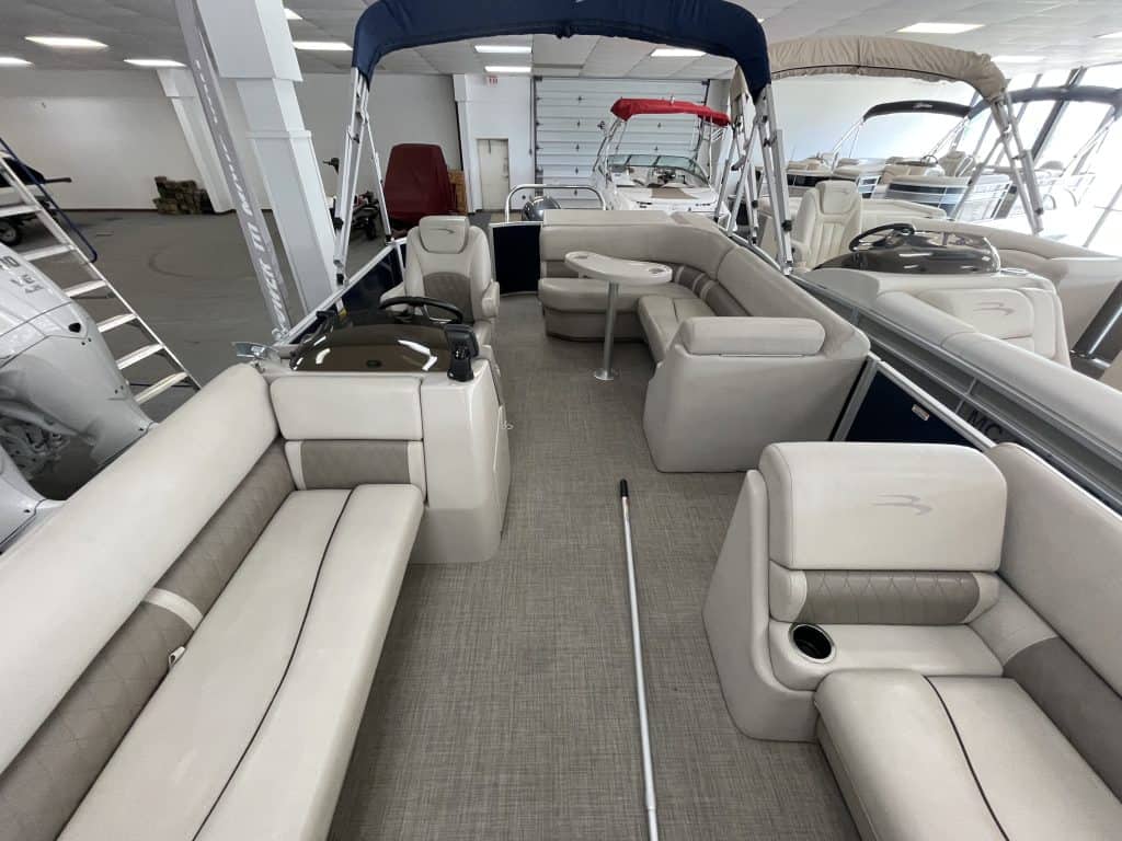 Bennington 21 SLX pontoon boat with spacious seating and canopy.