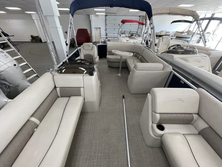Bennington 21 SLX pontoon boat with spacious seating and canopy.