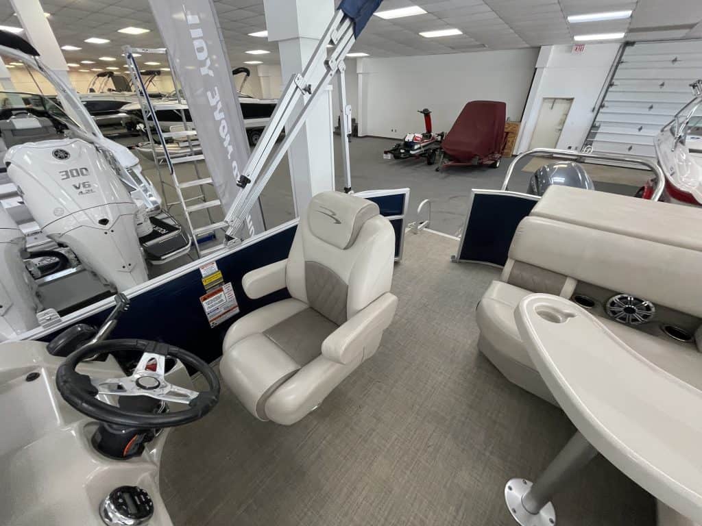Bennington 21 SLX boat displayed at Hall's Sport Center showroom.