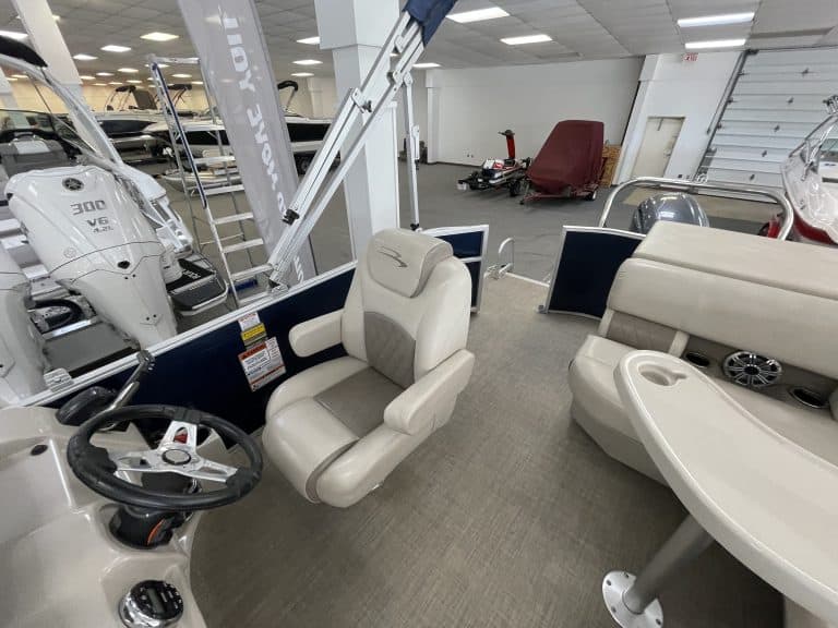 Bennington 21 SLX boat displayed at Hall's Sport Center showroom.