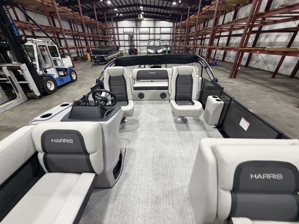Harris boat inside storage warehouse at Hall's Sport Center.